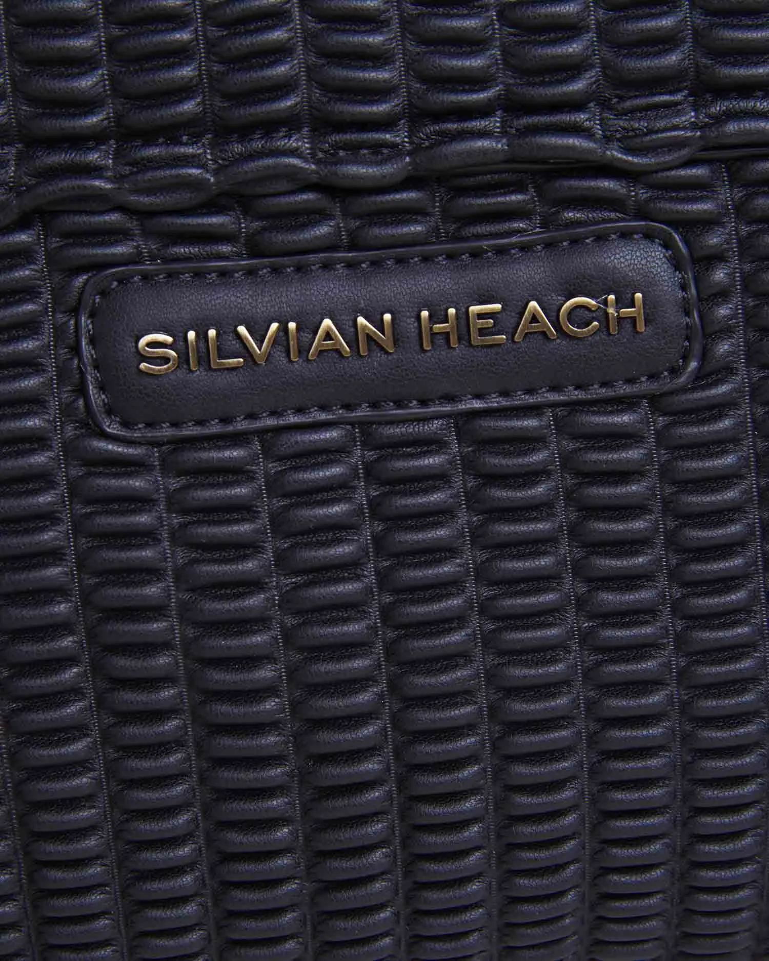 Handbag with chained shoulder strap